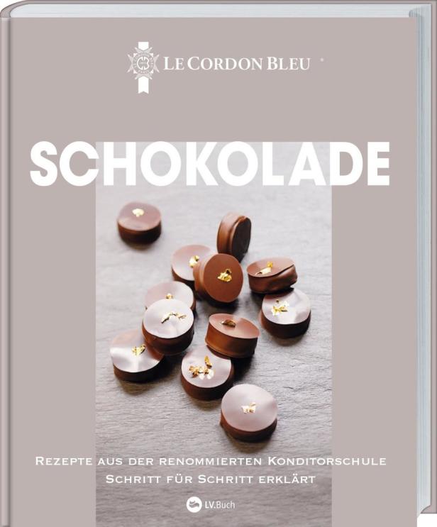Das Cover des Buches „Schokolade“ von Le Cordon Bleu mit Pralinen auf dem Titel.