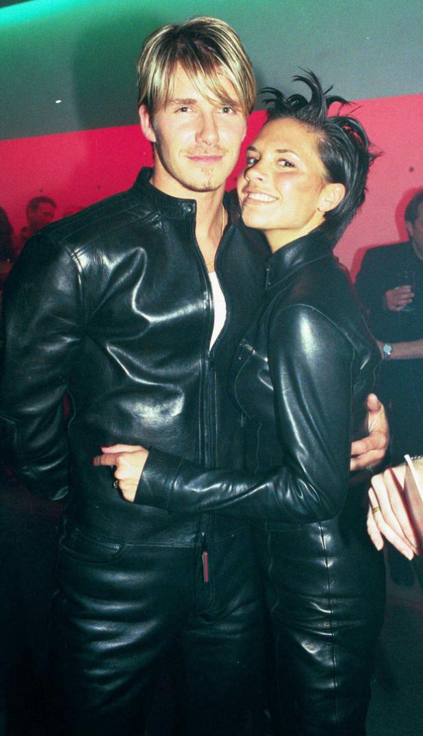 David und Victoria Beckham in passenden Lederoutfits.