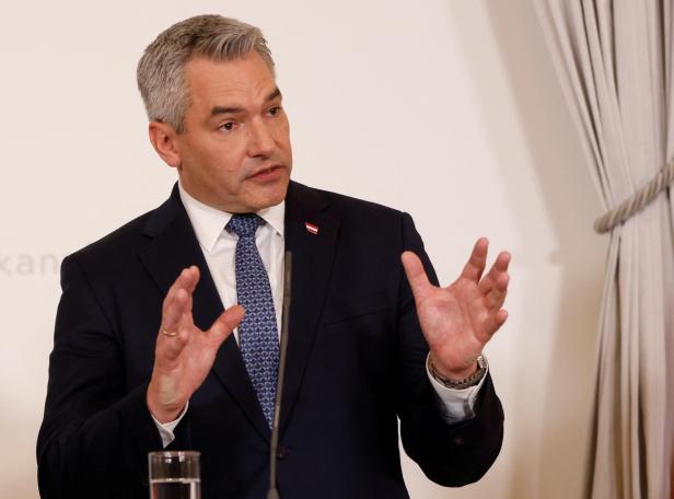 Austrian Chancellor Nehammer speaks during a press conference in Vienna