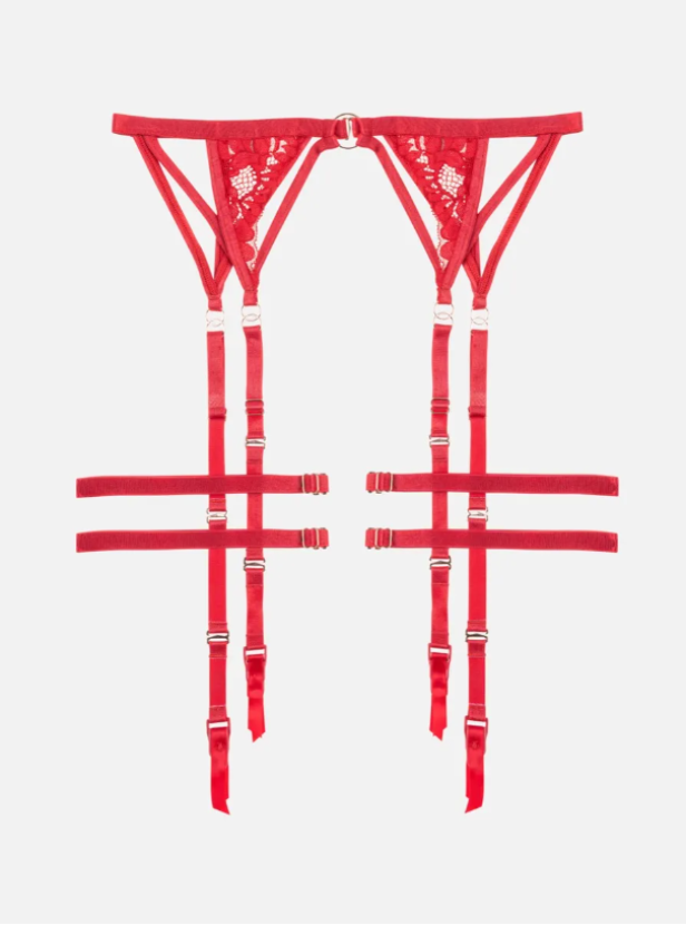 Ein roter Strumpfbandgürtel mit Spitze und verstellbaren Riemen.