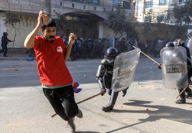 Nepalese police and pro-monarchy protesters clash in Kathmandu