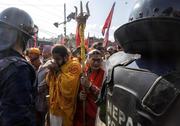 Nepalese police and pro-monarchy protesters clash in Kathmandu