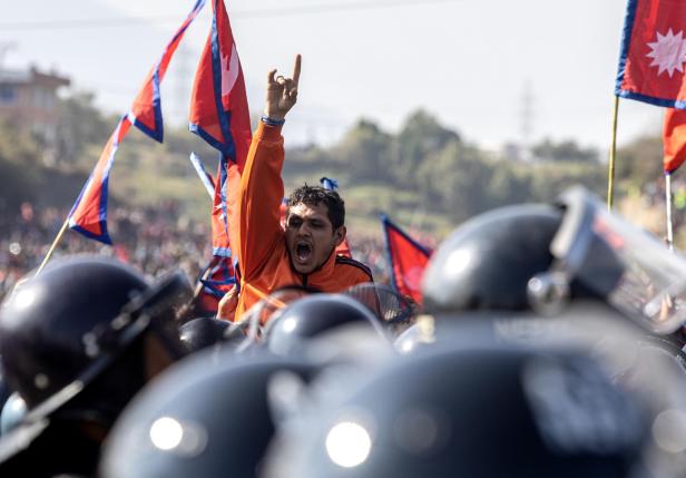Nepalese police and pro-monarchy protesters clash in Kathmandu
