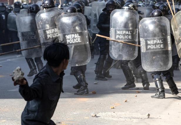 Nepalese police and pro-monarchy protesters clash in Kathmandu