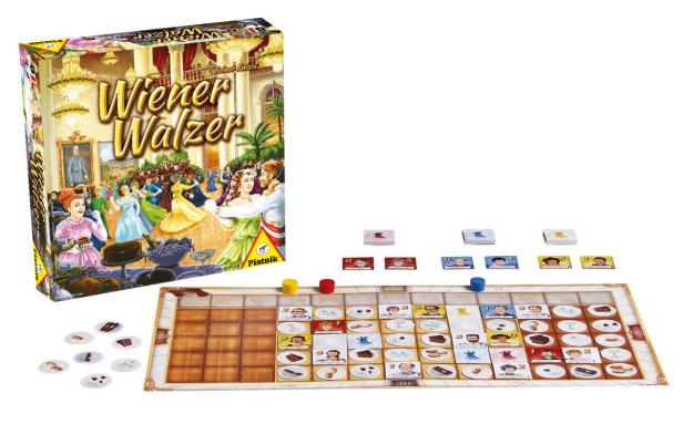 Das Brettspiel „Wiener Walzer“ mit Spielbrett, Karten und der Spielschachtel.