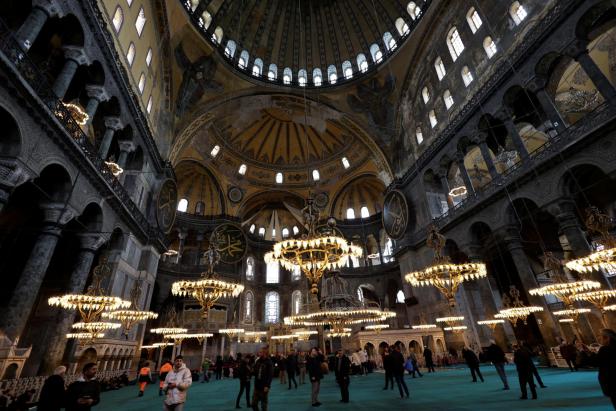People attend Friday prayers at Hagia Sophia Grand Mosque in Istanbul