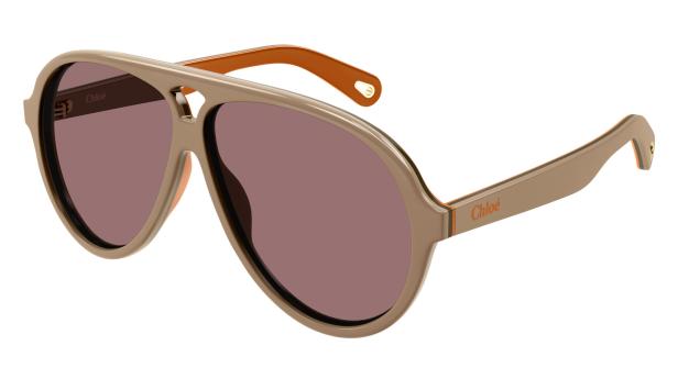 Eine braune Pilotenbrille der Marke Chloé mit orangefarbenen Akzenten.
