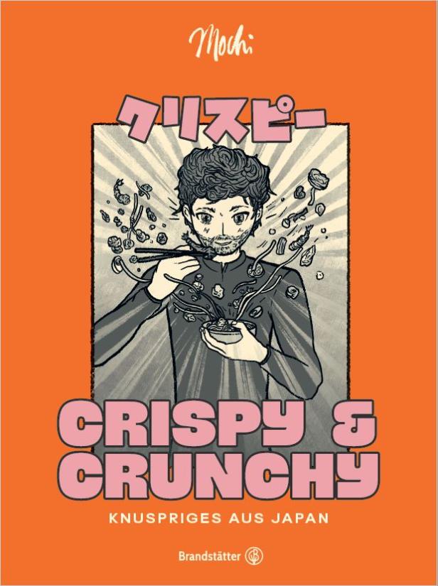 Ein Mann isst mit Stäbchen eine Mahlzeit von der Marke „Mochi: Crispy & Crunchy“.