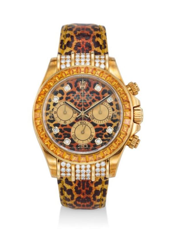 Eine goldene Rolex Daytona mit Leopardenmuster und Diamantenbesatz.