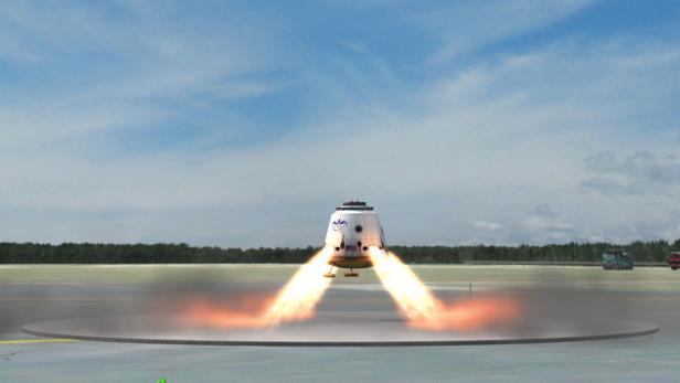 Eine Raumkapsel zündet ihre Triebwerke auf einer Startrampe.