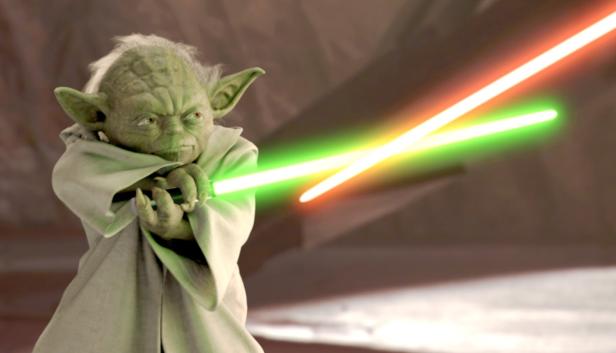Meister Yoda kämpft mit einem grünen Lichtschwert gegen ein rotes Lichtschwert.