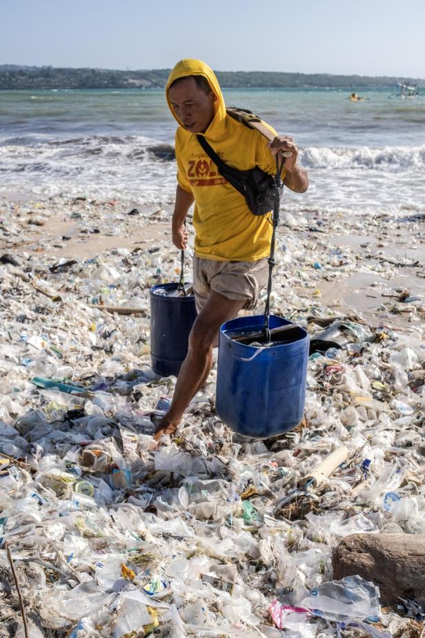 Plastic waste covers beach on the coast of Bali