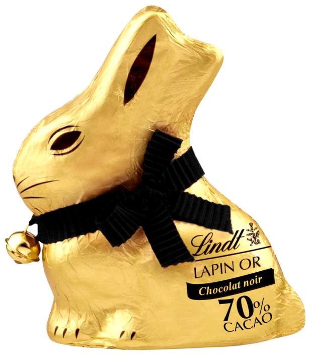Ein goldener Lindt Schokoladenhase mit schwarzer Schleife und Glöckchen.