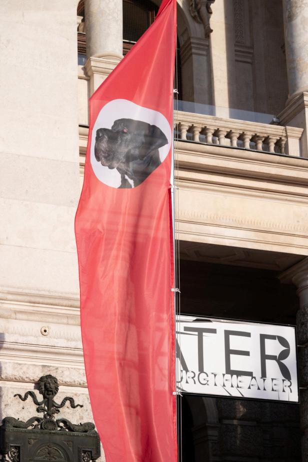 Austrian artist Flatz decorates Vienna's Burgtheater in Nazi-style flags featuring his dog Hitler, in Vienna