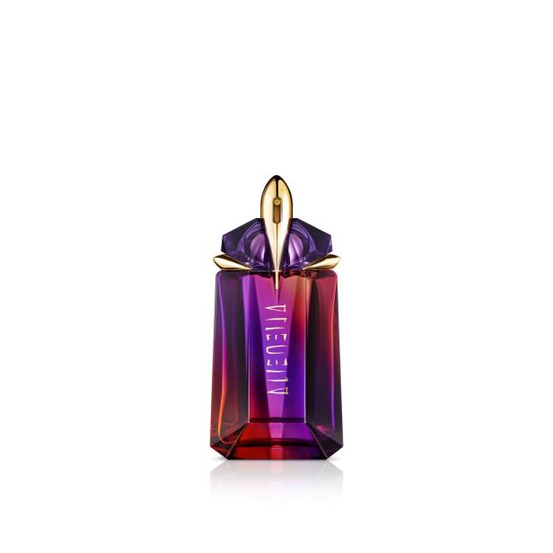 Ein Flakon des Parfüms „Alien“ von Thierry Mugler in Rot-, Lila- und Goldtönen.