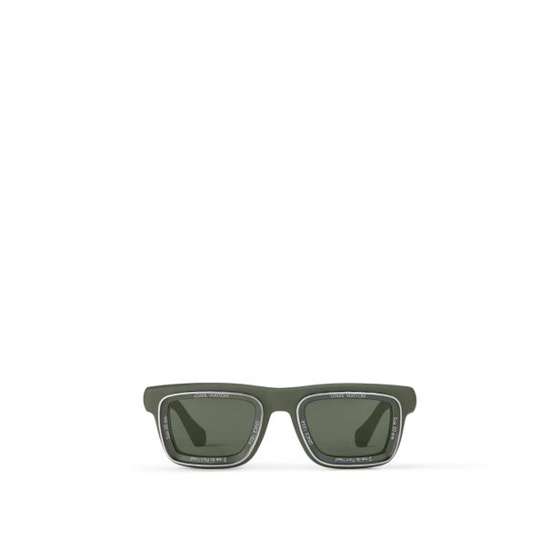 Eine olivgrüne Louis Vuitton Sonnenbrille mit Details in Silber und Gravuren.