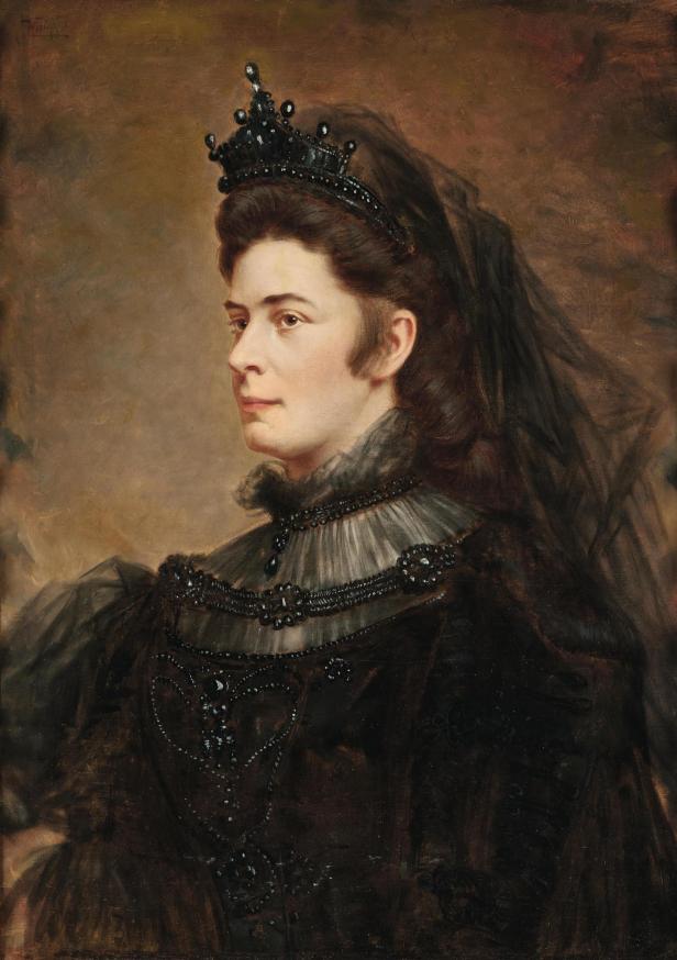 Porträt einer Frau im schwarzen Kleid mit Diadem, um 1890.