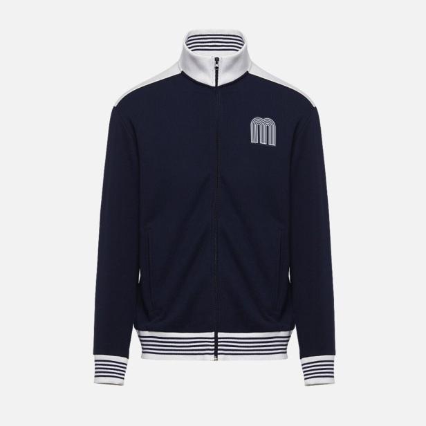 Eine marineblaue Trainingsjacke mit weißem Kragen, Schultern und Bündchen, verziert mit einem Logo.