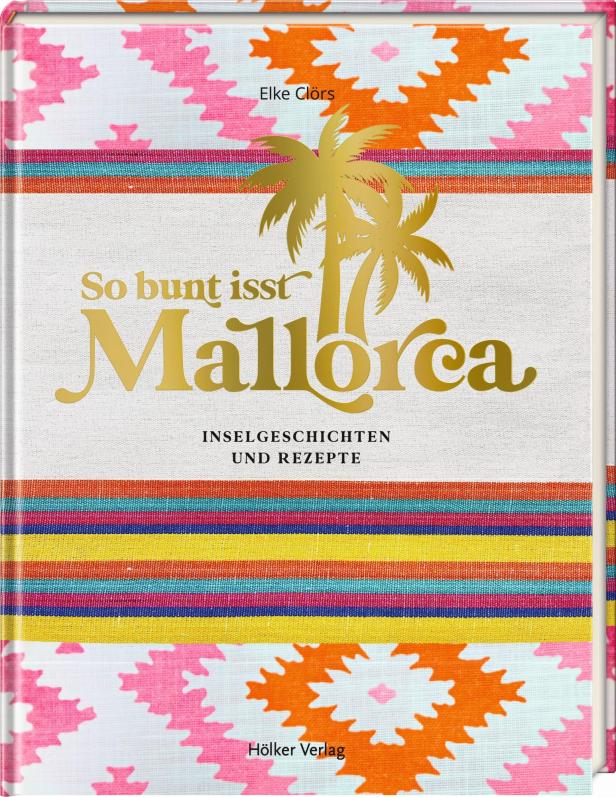 Das Buch „So bunt isst Mallorca“ von Elke Clörs mit goldenen Palmen auf dem Cover.