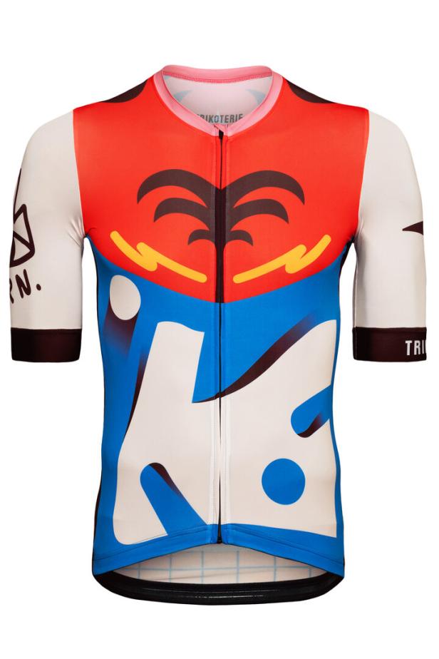 Ein farbenfrohes Radtrikot mit einem abstrakten Palmenmuster.