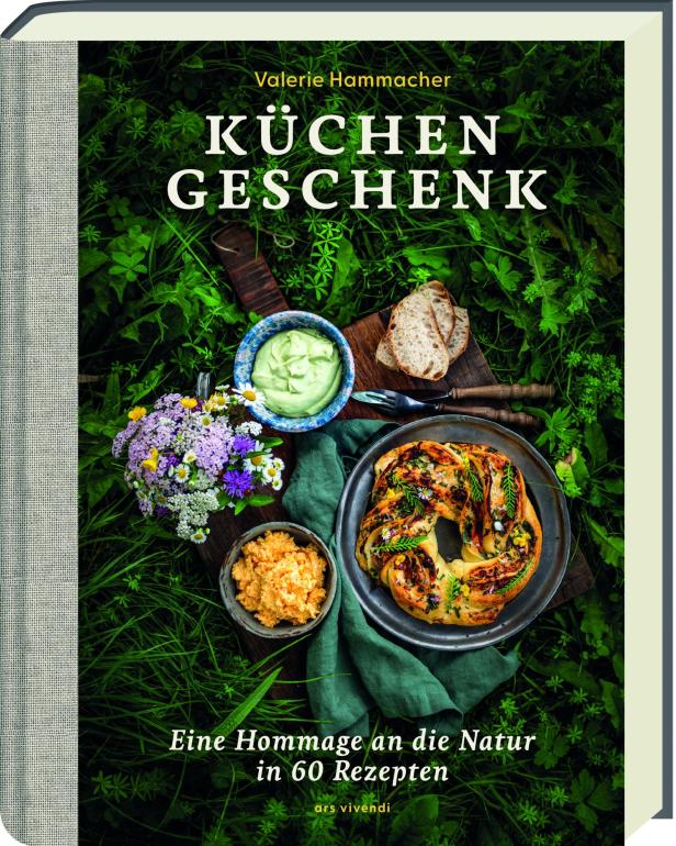 Das Cover des Kochbuchs „Küchengeschenk“ von Valerie Hammacher mit Speisen auf einer Wiese.