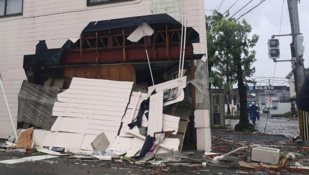 A house damaged by strong winds caused by Typhoon Shanshan is seen in Miyazaki, southwestern Japan