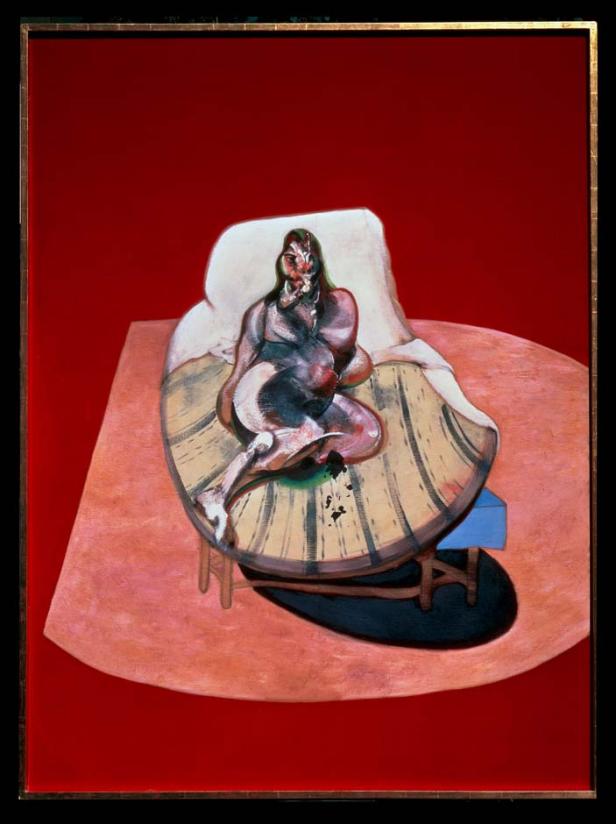 Ein Gemälde von Francis Bacon zeigt eine sitzende, schwangere Frau auf einem Bett vor rotem Hintergrund.