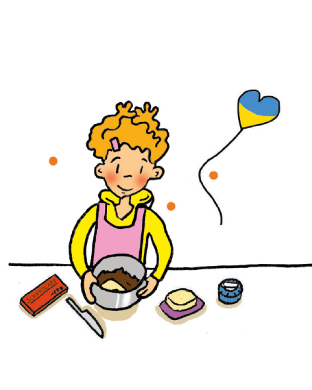 Ein Kind backt einen Kuchen; im Hintergrund ein Herzluftballon in den ukrainischen Nationalfarben.