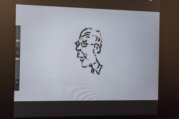 Eine Strichzeichnung eines Mannes mit Brille im Profil.