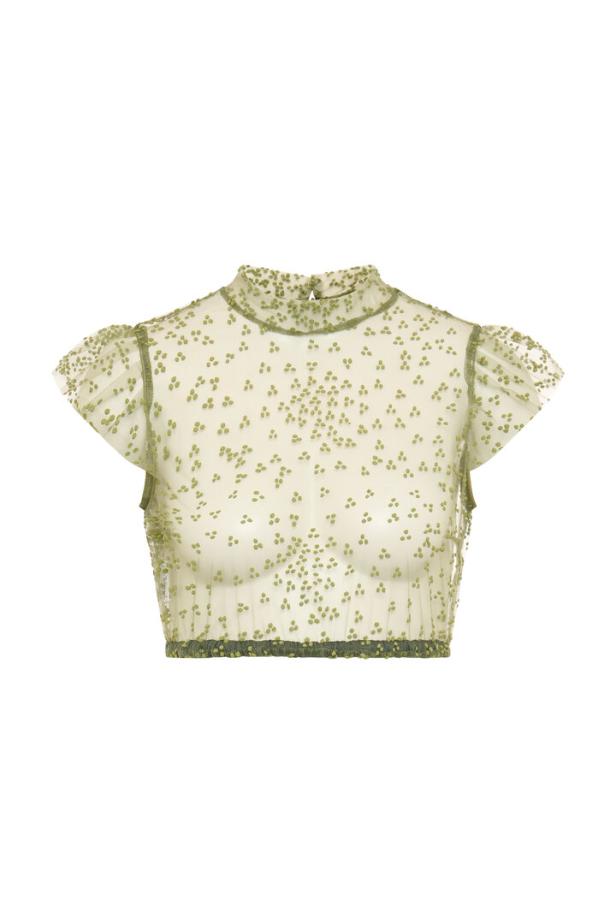 Ein transparentes, olivgrünes Crop-Top mit Stehkragen und kleinen Punktmustern.