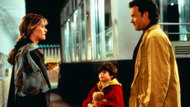 Szene mit Meg Ryan, Tom Hanks und einem Kind aus dem Film „Schlaflos in Seattle“.