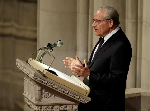 FILE PHOTO: Washington Post reporter Woodward eulogizes former Washington Post executive editor Bradlee during Bradlee's funeral service at the Washington Cathedral