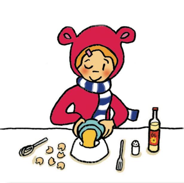 Lilli bereitet Nudelteig zu.