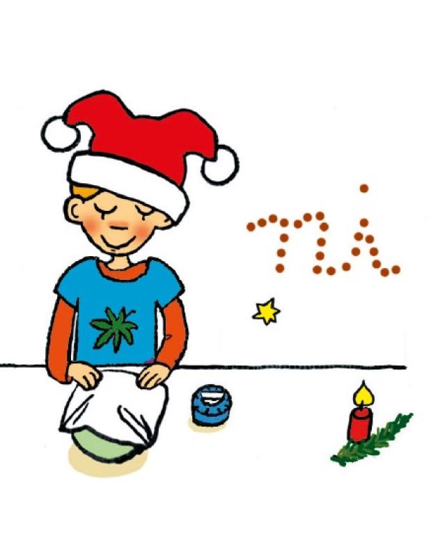 Ein Junge mit Weihnachtsmütze bereitet „Lillis Maronibraten“ zu.