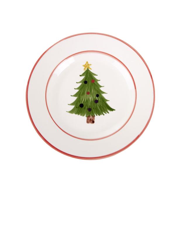 Ein Teller mit einem gemalten Weihnachtsbaum in der Mitte.