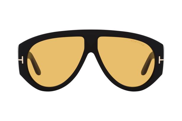 Eine schwarze Tom Ford Sonnenbrille mit gelben Gläsern.
