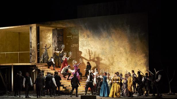 Wiener Szenenfotos und die Handlung des "Rigoletto"