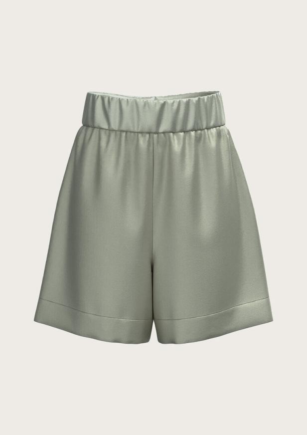 Eine kurze, hellgrüne Hose mit Gummibund.