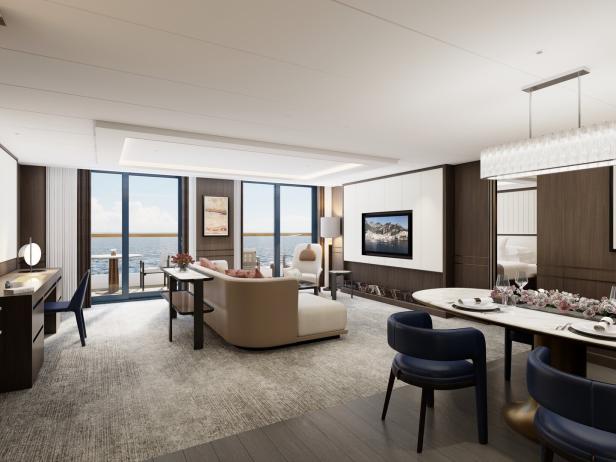 Ein luxuriöses Wohnzimmer mit Meerblick und eleganten Möbeln.