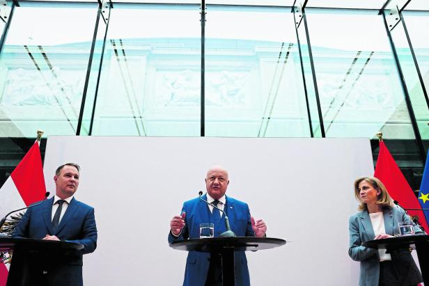 Austrian centrist parties give a press statement after finalizing coalition talks, in Vienna