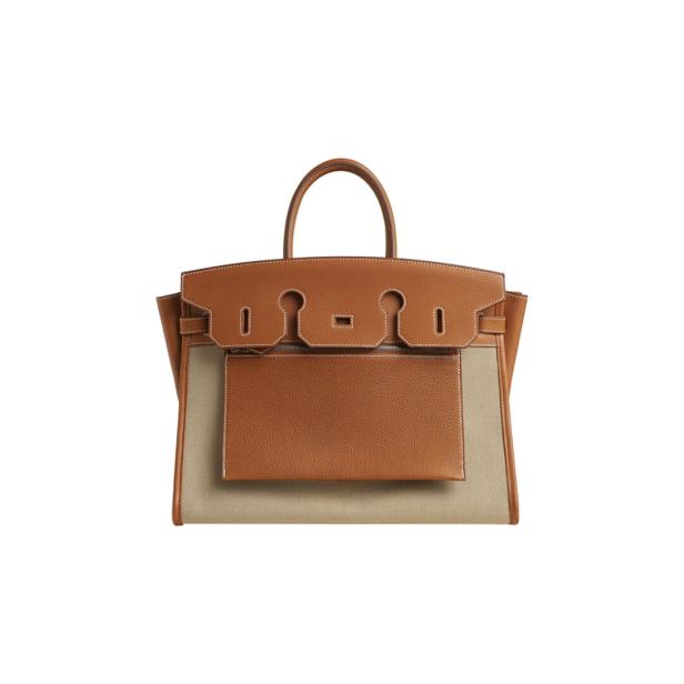Eine braune Hermès Birkin Handtasche mit beigen Stoffdetails.