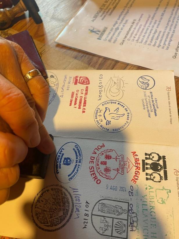 Pilgerpass wird gestempelt