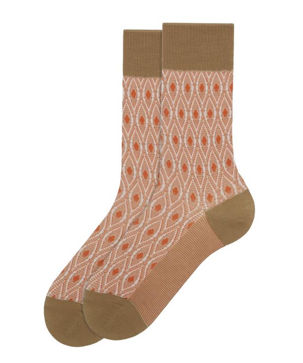 Zwei orangefarbene Socken mit einem Muster aus stilisierten Augen liegen übereinander.