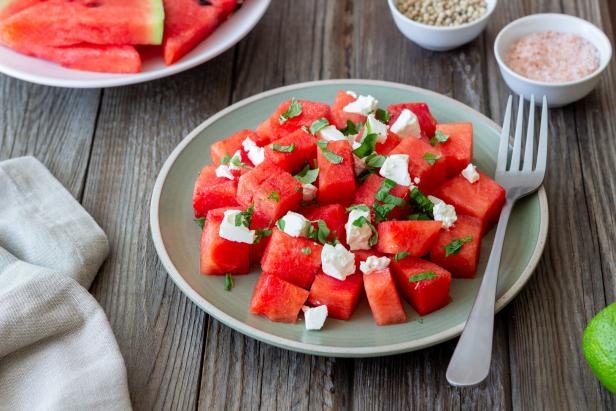 Salad with watermelon, white cheese and mint. Healthy eating. Vegetarian food. Salad with watermelon, white cheese and mint. Healthy eating. Vegetarian food.