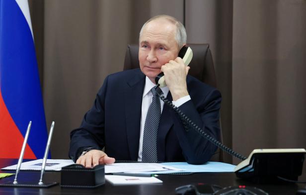 Russian President Putin speaks with participant of Christmas charity event in St Petersburg Russian President Putin speaks with participant of Christmas charity event in St Petersburg