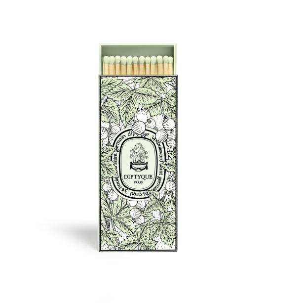 Eine Streichholzschachtel von Diptyque Paris mit einem floralen Muster.