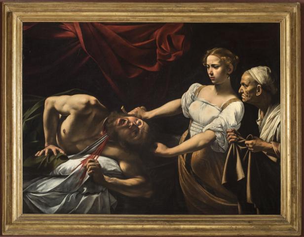 Das Gemälde „Judith enthauptet Holofernes“ von Caravaggio zeigt Judith mit einem Schwert in der Hand, wie sie Holofernes enthauptet.