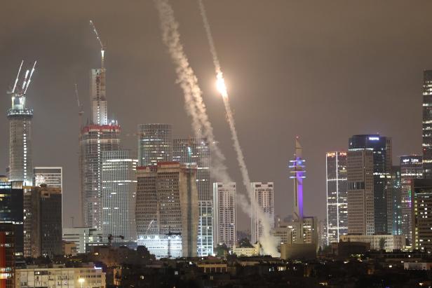 Israel's Iron Dome intercepts ballistic missiles fired from Iran over Tel Aviv Israel's Iron Dome intercepts ballistic missiles fired from Iran over Tel Aviv