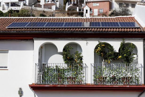 Solar panels are seen on the roof of a home in Ronda Solar panels are seen on the roof of a home in Ronda