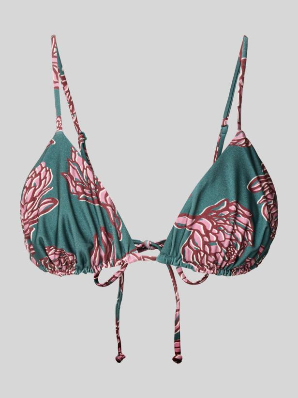 Ein grünes Triangel-Bikini-Oberteil mit rosa Blumenmuster.